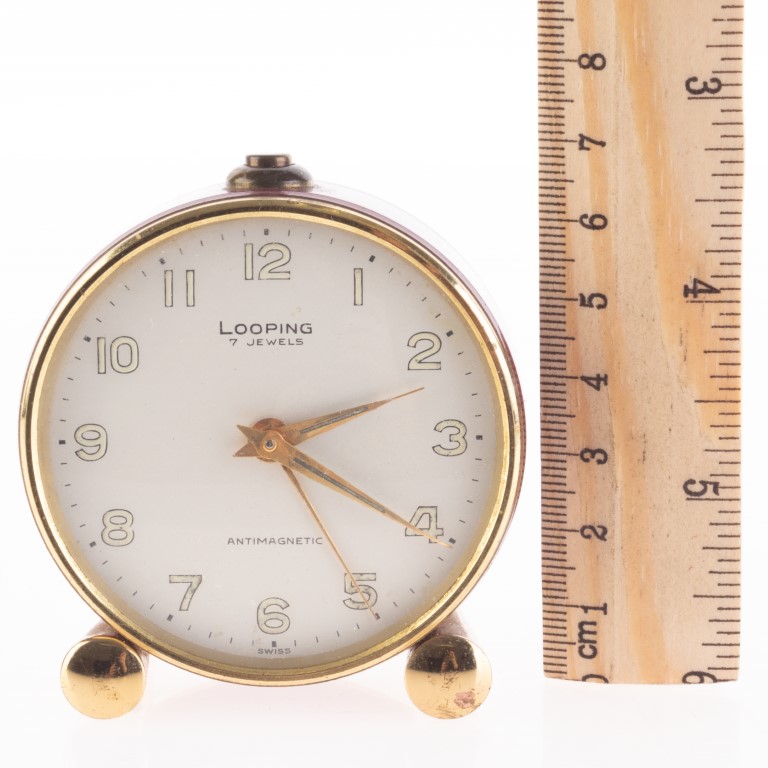 Looping 7 Jewels Desk Alarm Clock - Antique Auctions America